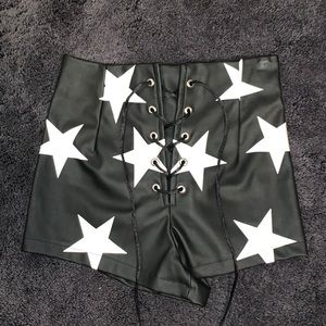 BLACK FAUX LEATHER LACE UP SHORTS WITH WHITE STARS